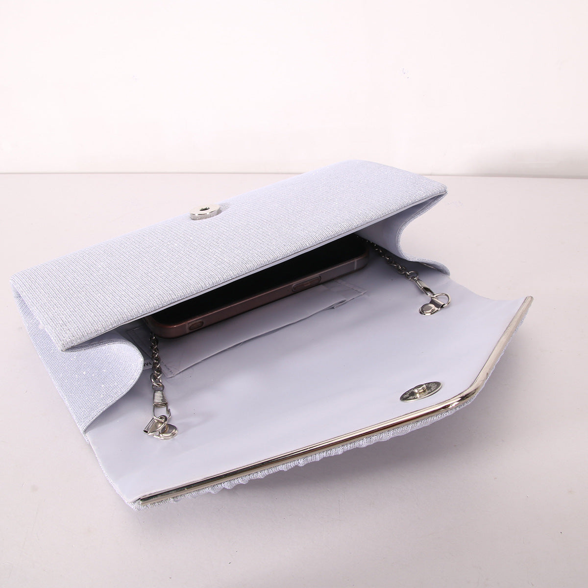 Stripes and Sequins Clutch Bag